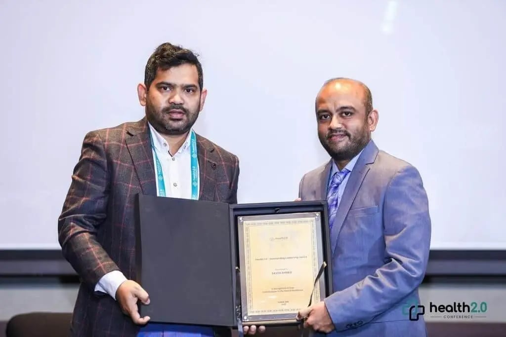 sayed award receiving photo (1)